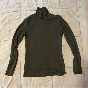 Tight black turtleneck